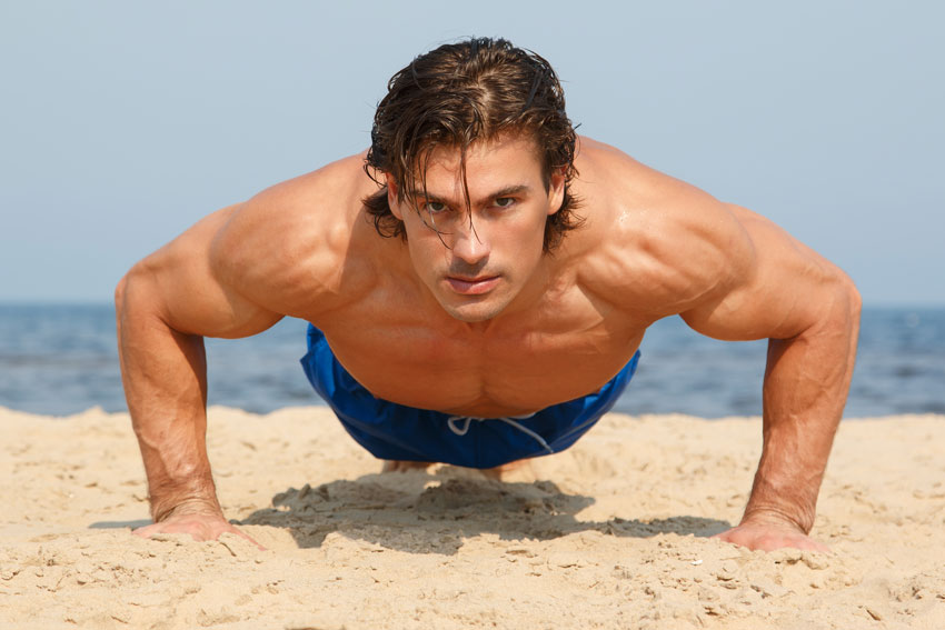 Man during workout on the beach