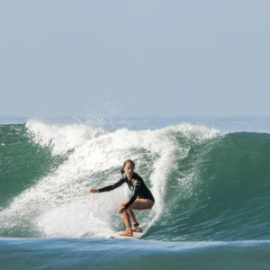 Woman surfing a wave