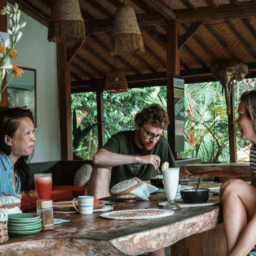 three people having breakfast in Bali